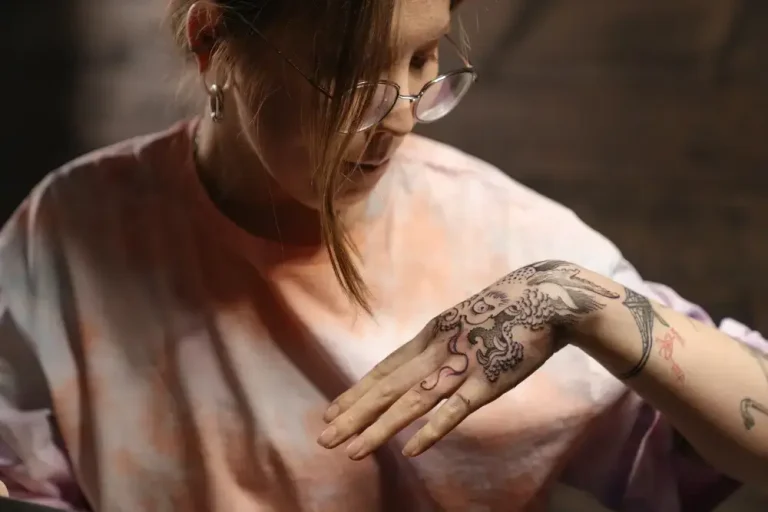 An infected tattoo may have severe pain, fever, oozing pus, or foul smells. Bruised tattoos are usually just swollen and discolored. If you suspect an infection, seek medical attention.